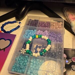 Green and white bracelet with cute snowflake charm to match